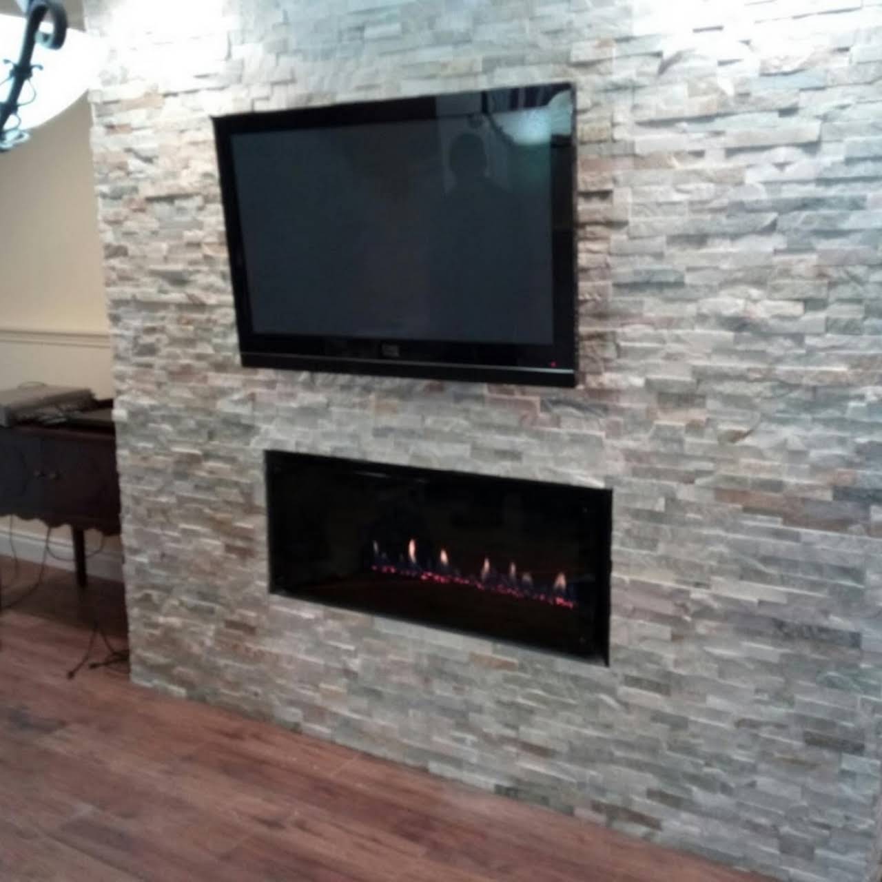 Old fireplace, reframe and rebuilt using ledger stones